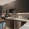 hich ceilings and ample counter space in open concept kitchen