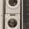 stacked washer/dryer units in closet